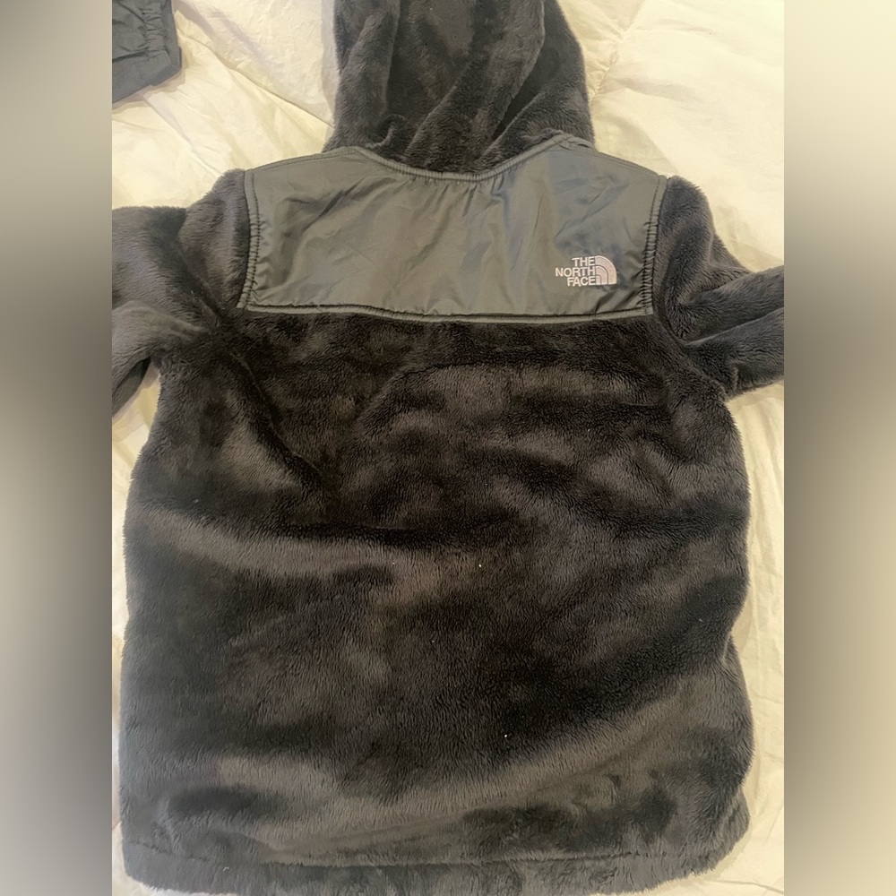 The North Face girls black fleece jacket